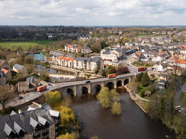 An aerial landscape of the West Yorkshire town of Wetherby with road bridge and weir over the river Wharfe