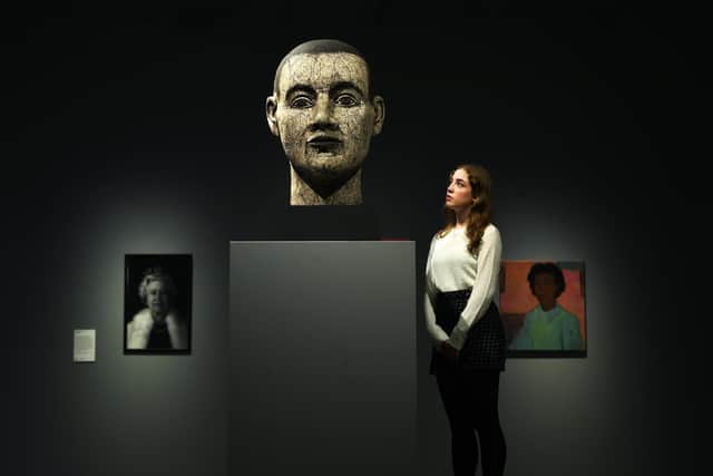 Amy Cope views Mapped Head by John Davies on display as part of the 'Treasures from the Stores'exhibition at York Art Gallery.
 18th November 2022.
Picture Jonathan Gawthorpe