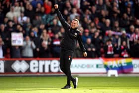 CHARACTER: Sheffield United manager Paul Heckingbottom celebrates with the Bramall Lane Kop at full-time