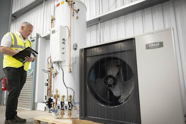 Production director John Cook inspects a Logic Air heat pump at the factory in Hull. Picture: Clay10.