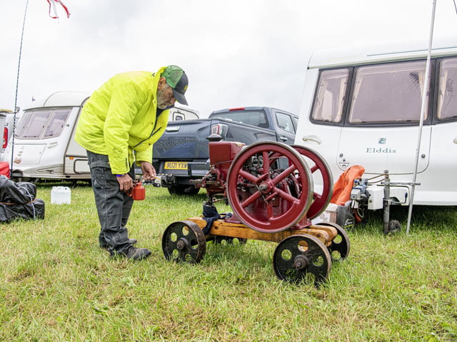 A visitor with his miniature engine