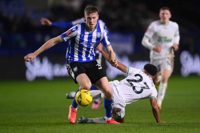 WAITING GAME: Centre-back Mark McGuinness is about to rejoin Cardiff City from Sheffield Wednesday