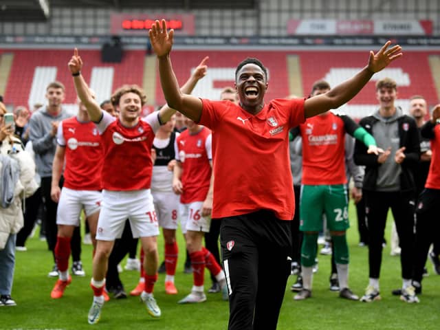 PARTY TIME: Chiedozie Ogbene leads the Rotherham United celebrations after securing the club's Championship status