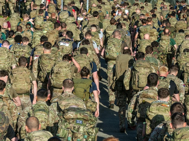 A group of soldiers competing.