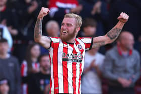 SHEFFIELD, ENGLAND - OCTOBER 01: Oliver McBurnie of Sheffield United celebrates after scoring their side's first goal during the Sky Bet Championship between Sheffield United and Birmingham City at Bramall Lane on October 01, 2022 in Sheffield, England. (Photo by George Wood/Getty Images)