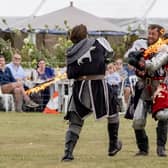 Chatsworth Country Fair 2025 - Sword battle during the Jousting performance in the grand arena by Knights of Middle England Jousting. By Marisa Cashill. August 30th 2025.