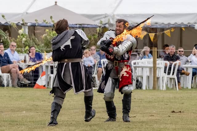 Chatsworth Country Fair 2025 - Sword battle during the Jousting performance in the grand arena by Knights of Middle England Jousting. By Marisa Cashill. August 30th 2025.