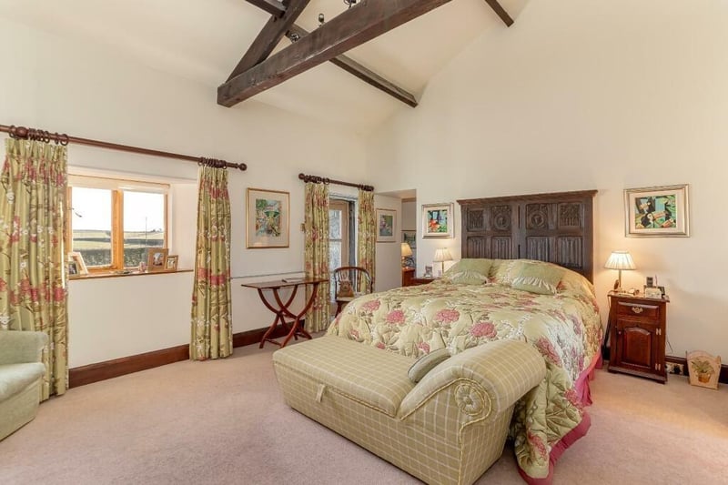 Another of the bedrooms with views over surrounding countryside