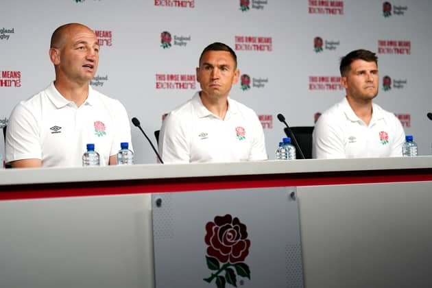 THE CHOSEN ONES: England head coach Steve Borthwick (left) and defence coach Kevin Sinfield (centre) make the England World Cup squad announcement at Twickenham yesterday. Picture: John Walton/PA