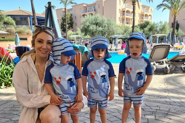Tanya with triplets Rupert, Austin and Ethan.