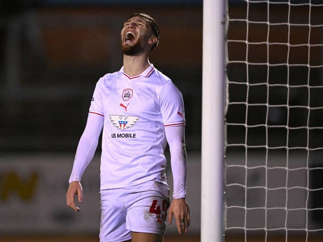 Frustration: Barnsley forward John McAtee hit the net at Blackpool but it was too little, too late for the Reds. (Picture: Stu Forster/Getty Images)