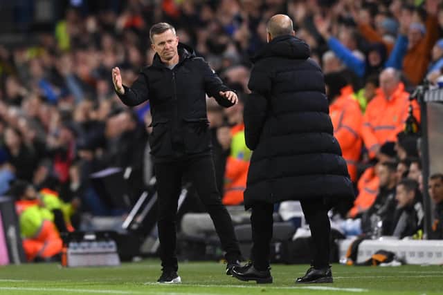 LEEDS, ENGLAND - DECEMBER 28: Jesse Marsch, Manager of Leeds United interacts with Pep Guardiola, Manager of Manchester City after the Premier League match between Leeds United and Manchester City at Elland Road on December 28, 2022 in Leeds, England. (Photo by Stu Forster/Getty Images)