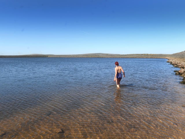 As temperatures rise a lady goes for a swim at Gaddings Dam Todmorden. Picture taken by Yorkshire Post Photographer Simon Hulme