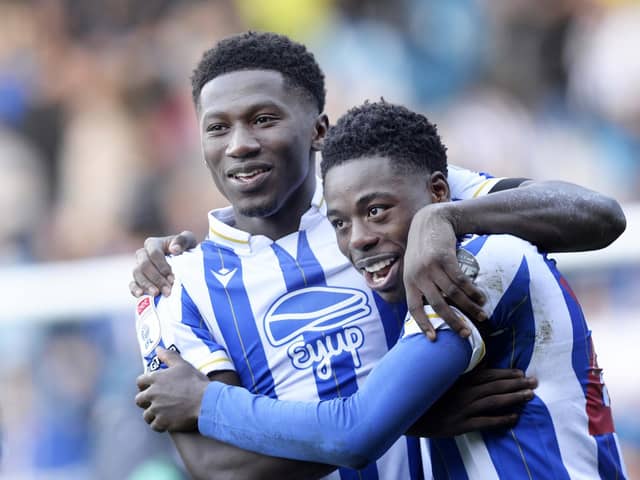 Winning feeling: Anthony Musaba, right, is congratulated by DiShon Bernard as Sheffield Wednesday claimed a third win of the season. (Picture: Steve Ellis)