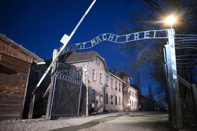 A general view of the 'Arbeit Macht Frei' gate at Auschwitz on January 27, 2025 in Oswiecim, Poland. The Nazis built and operated the Auschwitz complex of concentration camps during World War II initially for slave labor and later for the mass extermination of Jews and other undesirables. Approximately 1.1 million people died at Auschwitz (Photo by Victoria Jones - Pool/Getty Images)