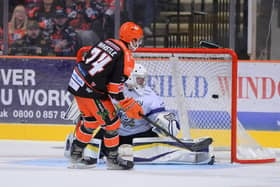 NICELY DOES IT: Brandon Whistle scores a penalty shot to make it 5-0 to Sheffield Steelers against Manchester Storm. Picture courtesy of Dean Woolley/EIHL.