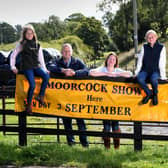 Preview for the Moorcock Show near Hawes. Kate Bell, show secretary, is pictured with her husband James and children Georgie and Isla at the showground entrance at Mossdale, near Hawes