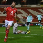 BARNSLEY, ENGLAND - MARCH 07: James Norwood of Barnsley celebrates after scoring the team's first goal during the Sky Bet League One between Barnsley and Portsmouth at Oakwell Stadium on March 07, 2023 in Barnsley, England. (Photo by Michael Regan/Getty Images)