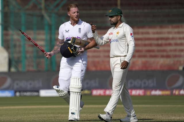 PROUD: England captain Ben Stokes, left, chats with Pakistan counterpart Babar Azam after winning the third test cricket match in Karachi Picture: Photo/Fareed Khan