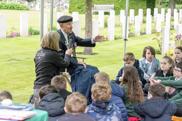 D-Day veteran Ken Cooke chats with pupils from Willow Tree Community Primary School. PIC: Tony Johnson