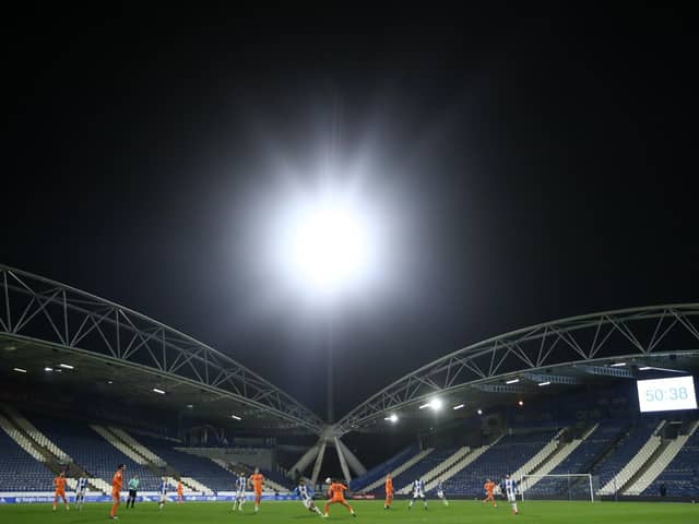 NEGOTIATIONS: THE future of Huddersfield Town and Huddersfield Giants' John Smith's Stadium home is still being discussed