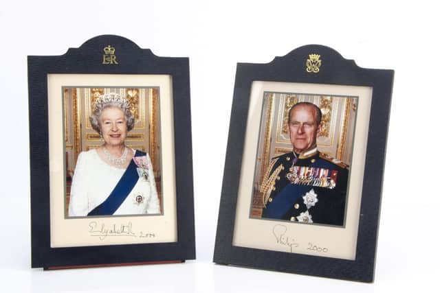 Framed photographs of Queen Elizabeth II and Prince Philip, owned by the late Baroness Betty Boothroyd. The estate of the first female Speaker of the House of Commons Baroness Betty Boothroyd is set to go under the hammer with the proceeds divided between six charities. Special Auction Services/PA Wire