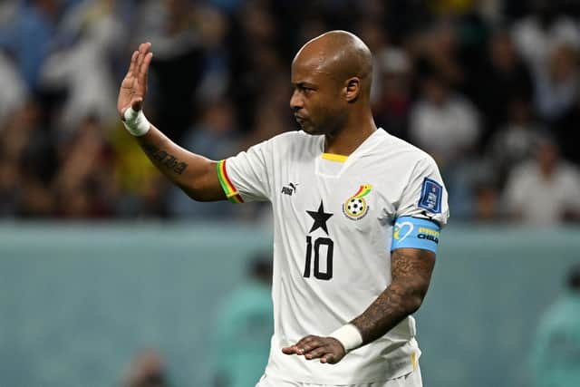 Ghana's midfielder #10 Andre Ayew gestures during the Qatar 2022 World Cup Group H football match between Ghana and Uruguay at the Al-Janoub Stadium in Al-Wakrah, south of Doha on December 2, 2022. (Photo by PABLO PORCIUNCULA/AFP via Getty Images)