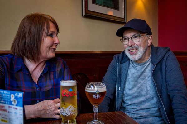 Wetherspoons mad couple Phil Fox and his wife Julie with their favourite choice of beverage at The Richard Oastler Wetherspoon in Brighouse