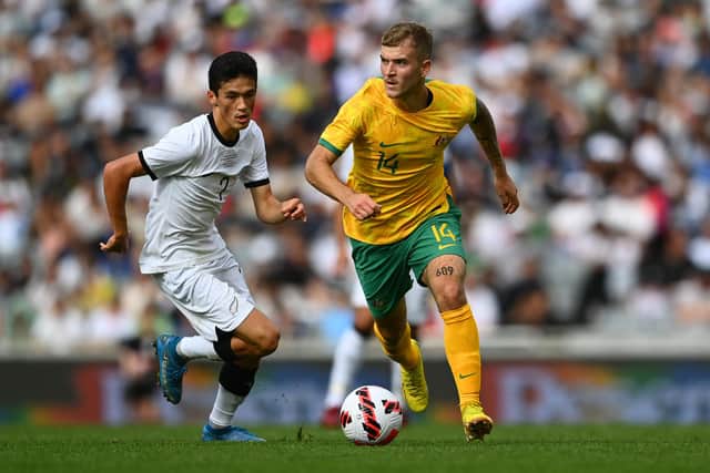 AUCKLAND, NEW ZEALAND - SEPTEMBER 25: Riley McGree of the Socceroos makes a break during the International Friendly match between the New Zealand All Whites and Australia Socceroos at Eden Park on September 25, 2022 in Auckland, New Zealand. (Photo by Hannah Peters/Getty Images)