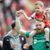 HAPPIER TIMES: Viktor Johansson celebrates Rotherham United escaping Championship relegation last season
