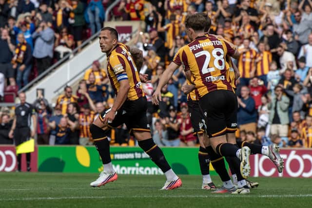 Bradford City's Antoni Sarcevic celebrates his match-winning goal in the first half against Mansfield Town. Photo: Tony Johnson.