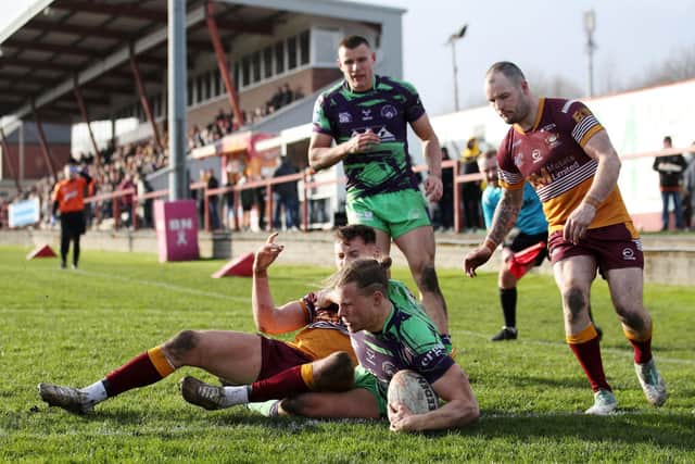 GETTING THERE: Castleford Tigers' Jacob Miller scores his side's fourth try against Batley in their Betfred Challenge Cup sixth round clash at Fox's Biscuits Stadium. Picture: Jess Hornby/PA