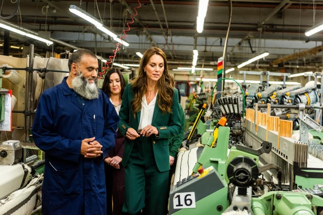 Her Royal Highness The Princess of Wales chatting with Zeb Akhtar, Senior Weaver Trainer, during her visit around the factory. Picture By Yorkshire Post Photographer,  James Hardisty.