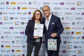 Rachel Spencer, owner of Sunnyside Cottage in Robin Hood's Bay, with Dragon's Den star Theo Paphitis.
