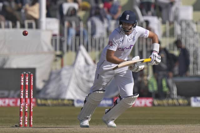BACK ON FORM: Yorkshire's Joe Root pushes through the covers in his knock of 73 for England against Pakistan on day four of the first Test match in Rawalpindi Picture: AP Photo/Anjum Naveed