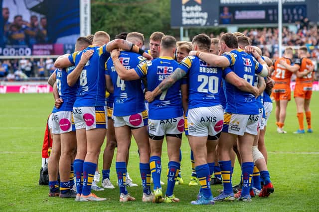 Leeds Rhinos huddle together at full-time. (Picture: Bruce Rollinson/SWpix.com)