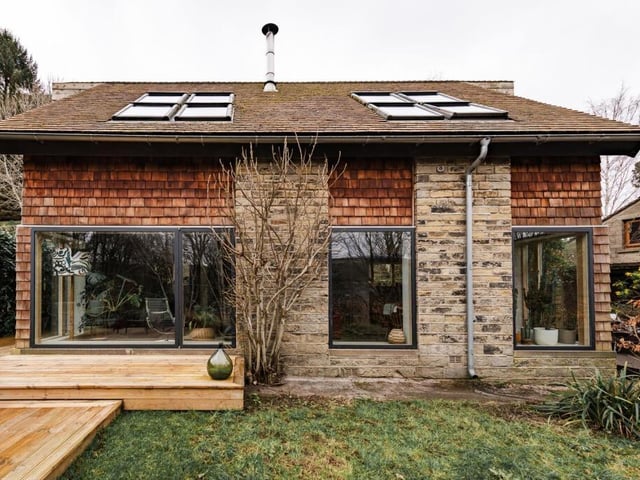 The serene garden at the back of the house has decked areas for sitting out.
