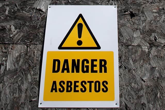 File pic: an asbestos warning sign.