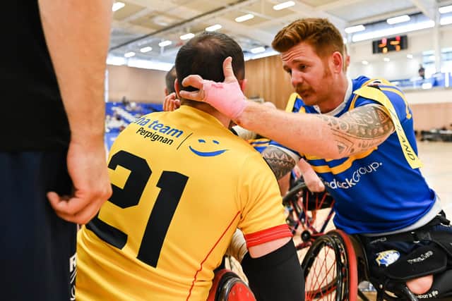 James Simpson consoles Jonathan Hivernat of Catalan Dragons after Leeds Rhinos' 2022 Challenge Cup win. (Photo: Will Palmer/SWpix.com)