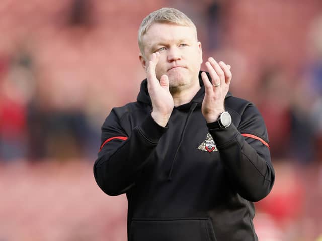 CONTROL: Doncaster Rovers manager Grant McCann  applauds the fans at full-time