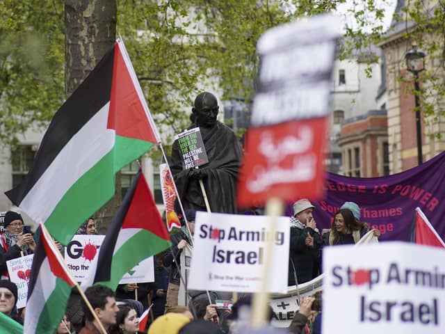 People gather in Parliament Square ahead of a pro-Palestine march in central London. PIC: Jeff Moore/PA Wire