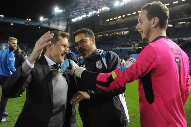 JOY: Huddersfield Town chairman Dean Hoyle, coach David Wagner and goalkeeper Danny Ward celebrate reaching the Campionship play-off final after holding Sheffield Wednesday to a 0-0 draw in the first leg