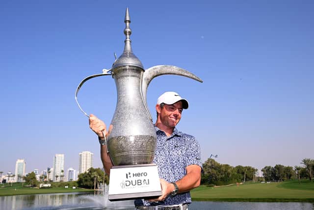Rory McIlroy of Northern Ireland celebrates winning the Dubai Desert Classic for a third time (Picture: Ross Kinnaird/Getty Images)
