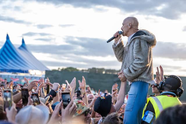 Tim Booth ofJames sings to the crowd at Y Not festival, Pikehall, Derbyshire. Picture: Scott Antcliffe
