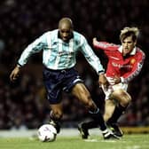 19 Dec 1998:  Brian Deane of Middlesbrough holds off the challenge from Philip Neville of Manchester United during the FA Carling Premiership match against Manchester United played at Old Trafford in Manchester, England. (Picture: Shaun Botterill /Allsport)