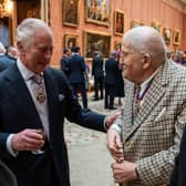 File photo dated 24/11/22 of King Charles III (left) talking with Mr David Hockney during a luncheon for Members of the Order of Merit at Buckingham Palace, London. 