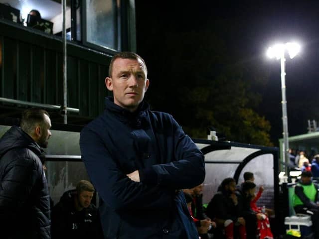 Barnsley manager Neill Collins looks on prior to the club's ill-fated FA Cup first-round replay at Horsham earlier this month. Photo by Charlie Crowhurst/Getty Images.