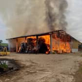 The fire at West Yorkshire dairy farmer, Sam Naylor's, farm which was caused by overheating.
