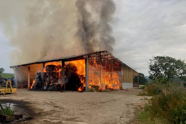 The fire at West Yorkshire dairy farmer, Sam Naylor's, farm which was caused by overheating.