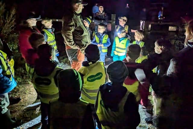 The Elvington Scout Group exploring the area in their hi-vis vest from Specsavers Acomb
